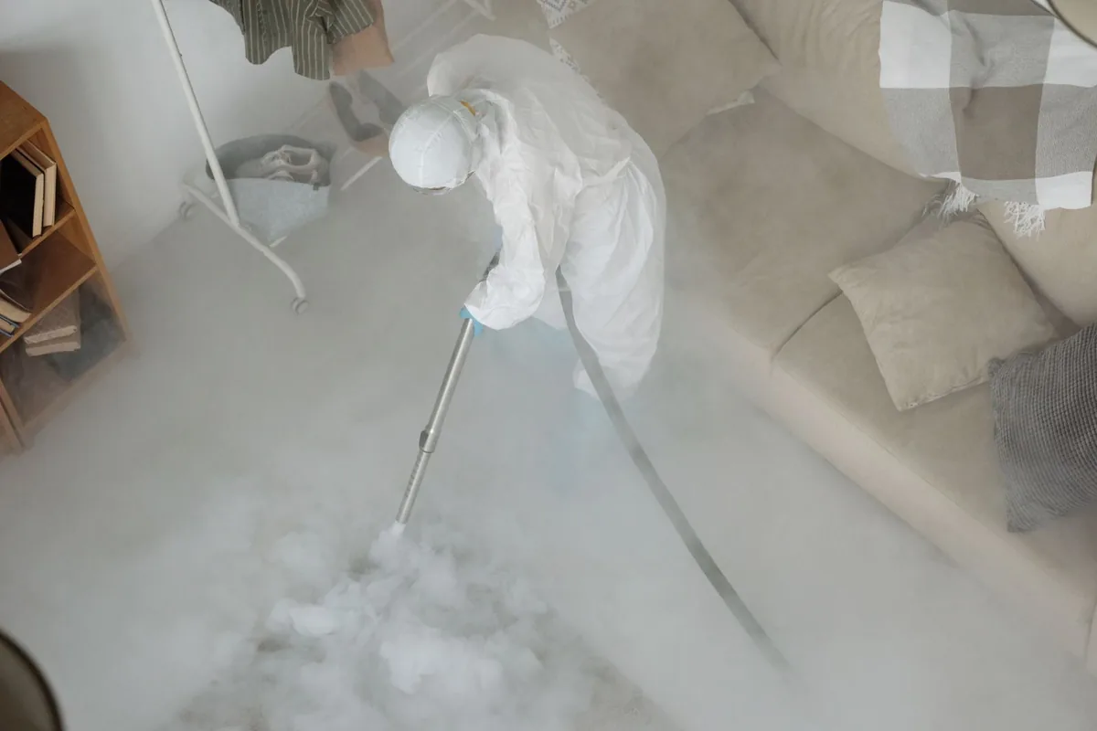 Biohazard cleanup technician in protective equipment, Bardmoor, FL